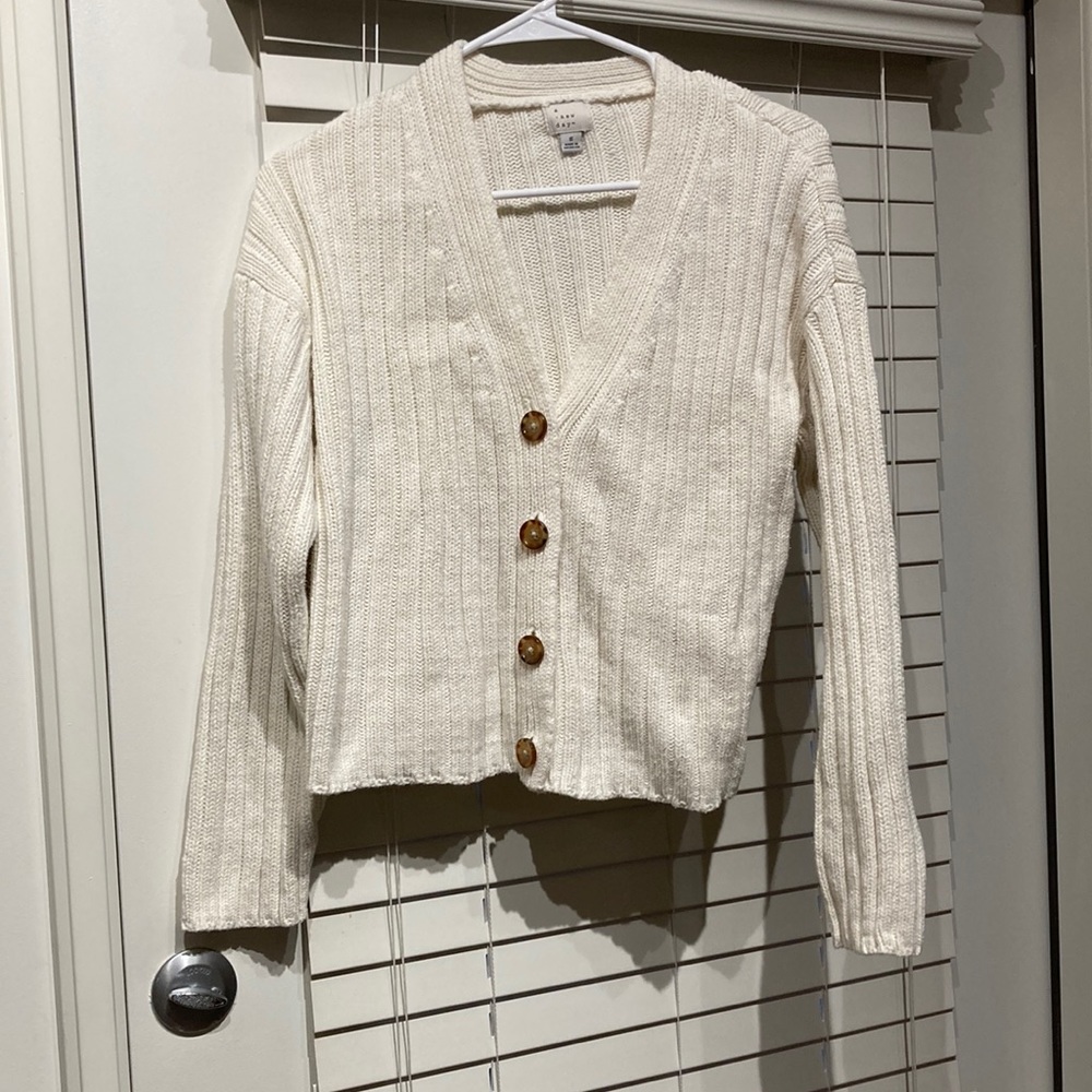 Adorable chucky knit sweater.